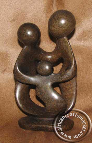 African Soapstne Abstract embracing mother and child