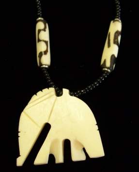 Vtg Hand carved Bovine Bone Necklace and Pendant Elephants | EstateSales.org