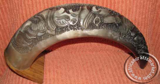African carved Nguni cow hornd white