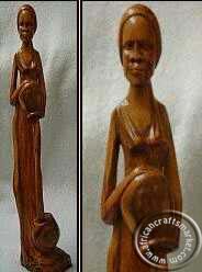 Wooden tribal working figurine
