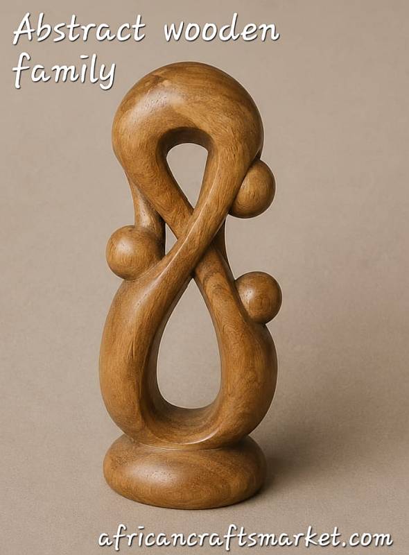 Hand-carved abstract wooden 3-head family sculpture featuring stylized, interlocking faces in a rich natural grain finish