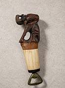 Bone and wood bottle openers Labeled African bone and wooden Elephant bottle opener