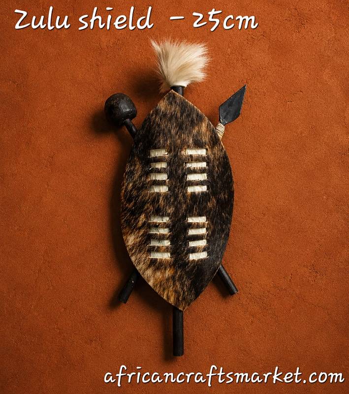 Traditional African cattle hide Zulu shield measuring 25 cm, authentic handcrafted South African tribal curio