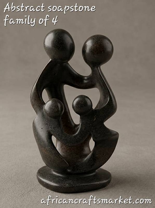 Hand-carved African soapstone abstract sculpture representing a family of 4 with smooth, interlocking parents and two children figures.