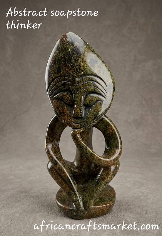 Authentic hand-carved African soapstone abstract sculpture of a thinking figure, neutral earth tones, minimalist home decor style