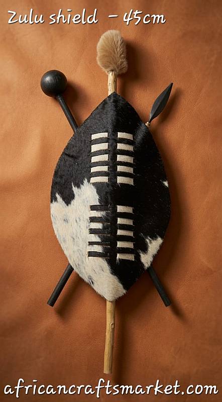 Front view of an authentic 45 cm African Zulu shield crafted from genuine speckled Nguni cowhide, handmade in KwaZulu-Natal.