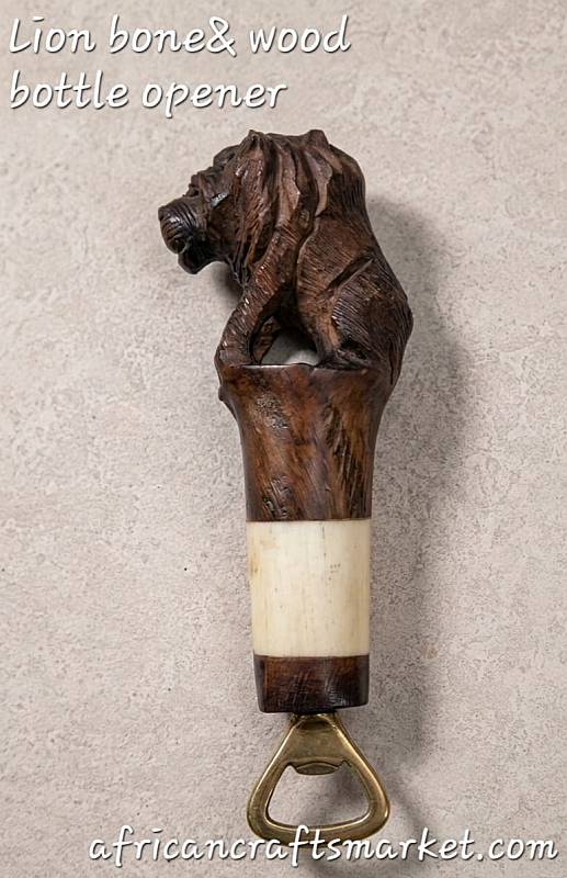 Lion wood and bone bottle opener A luxury handcrafted African bottle opener shaped like a lion, featuring a detailed body hand-carved from local hardwood and a face beautifully accented with polished, smooth animal bone