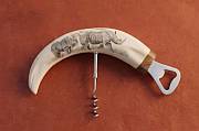 Genuine African Warthog Tusk Bottle Opener Authentic African warthog tusk bottle opener with a polished brass fitting, ideal for luxury safari bar decor
