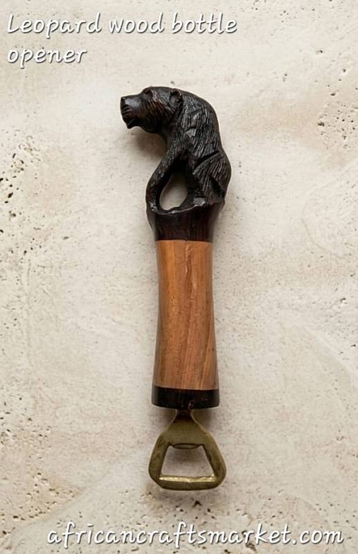 Leopard wood bottle opener A selection of handcarved wooden leopard bottle openers arranged at our export warehouse, packed and ready for international shipping